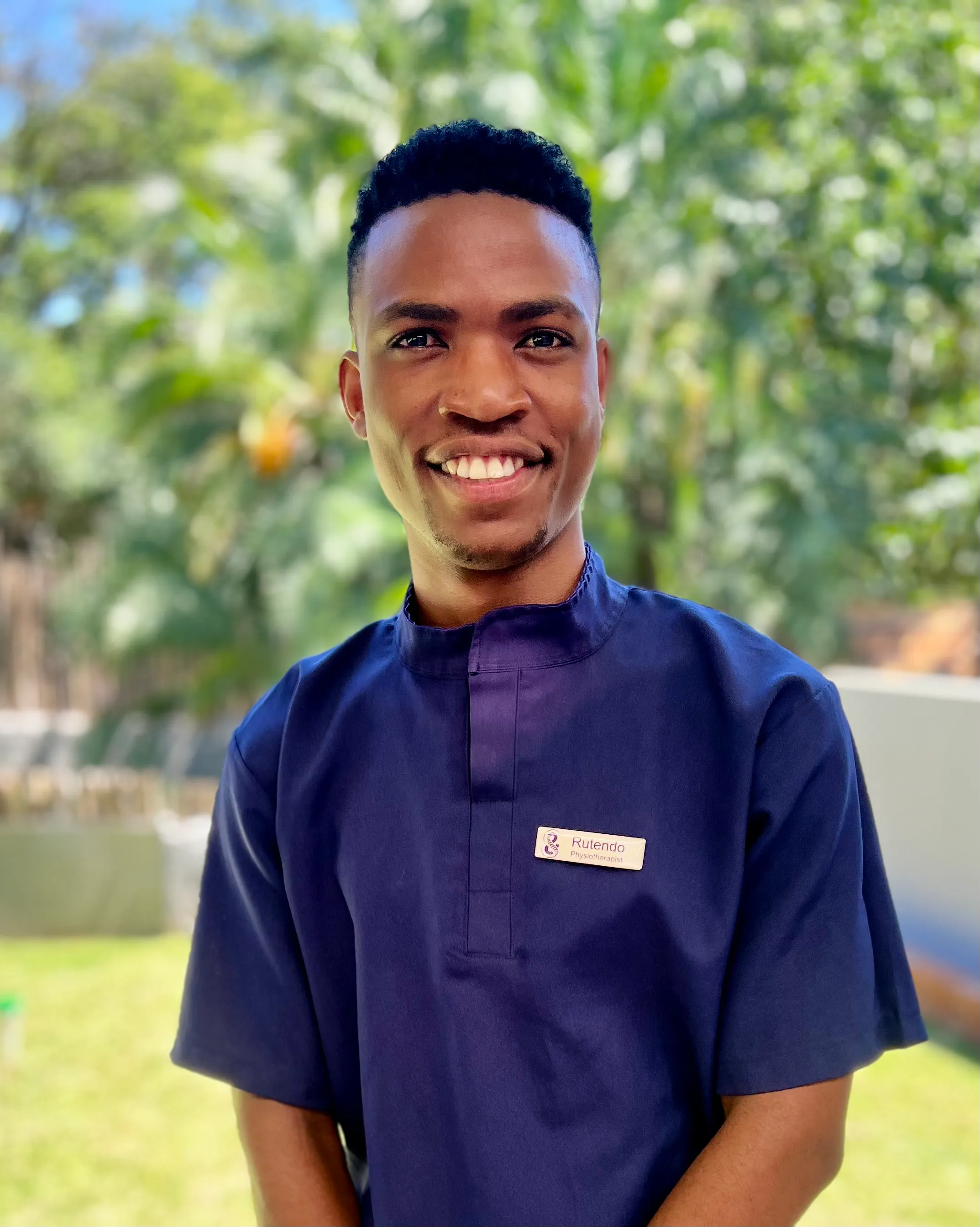 Walnut card tray filled with cards and card angled in dedicated groove.